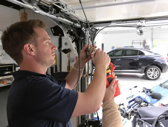Westerly Garage Door Repair safety certified technician performing cable replacement in Westerly