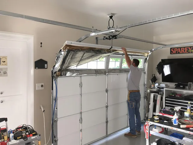 Garage door section replacement by Westerly Garage Door Repair in Westerly
