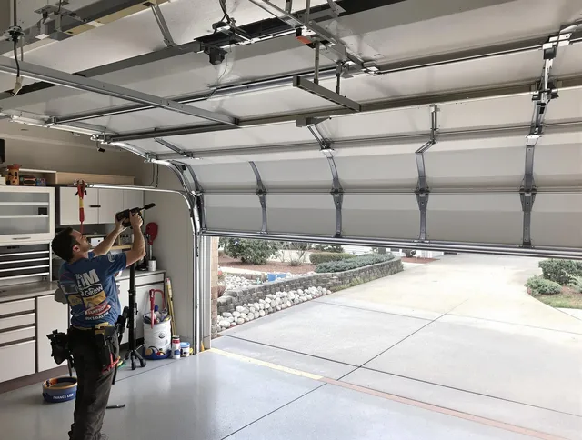 Garage door track repair service by Westerly Garage Door Repair in Westerly